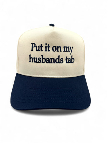 Put It On My Husband's Tab Snapback Trucker Hat